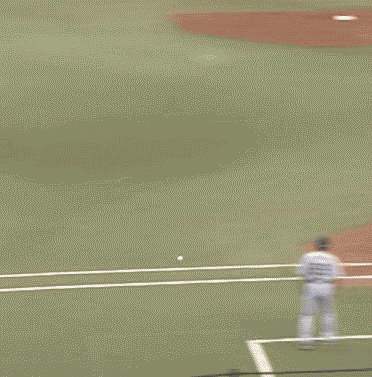 Baseball Hits First Base Pops Up